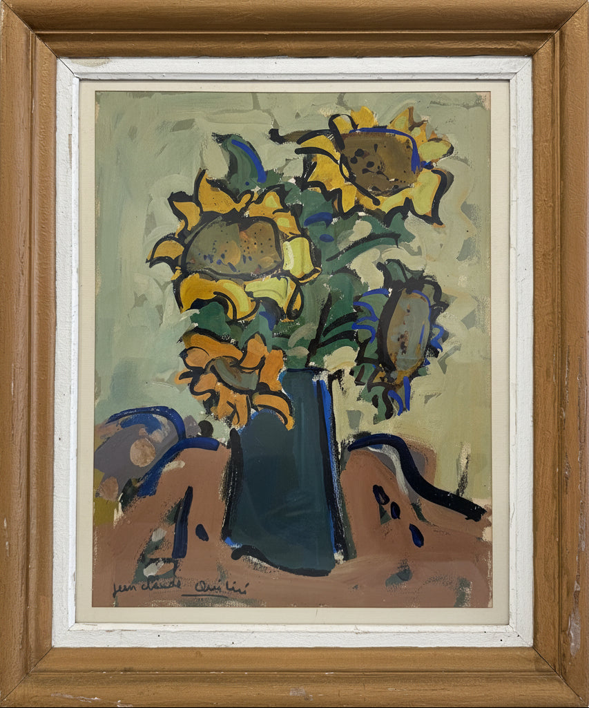 A framed still life painting of sunflowers in a dark blue vase, with visible brushstrokes and a gold-toned wooden frame.